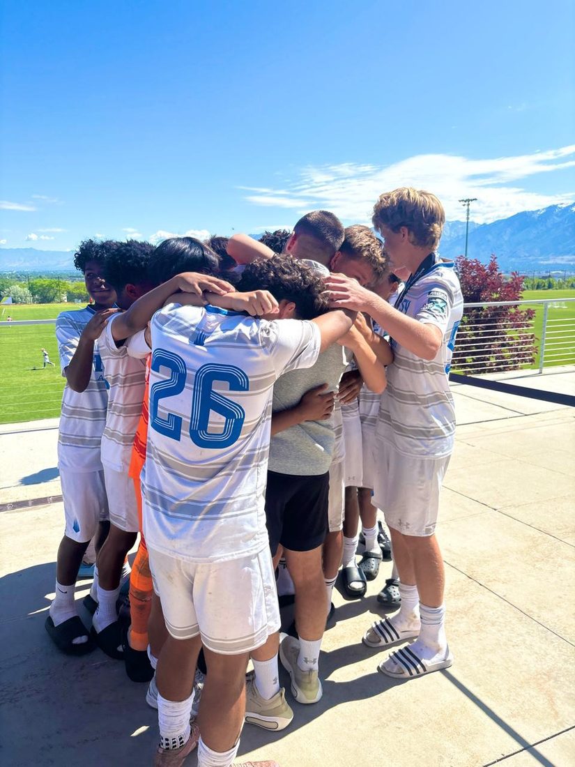The squad huddled together before kick-off