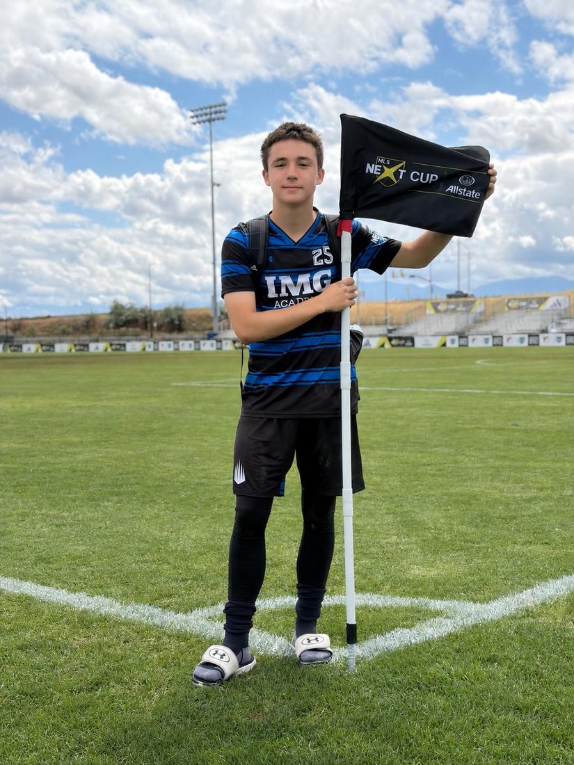 A young player at the corner flag on match day
