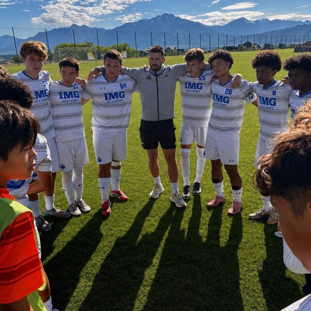 Connor MacDonald with his team in a pre-match huddle